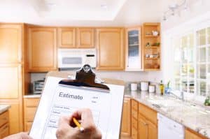 Man estimating kitchen cost