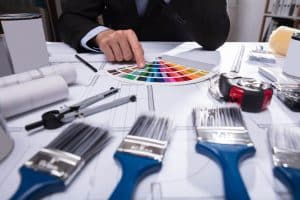 Man choosing paint color